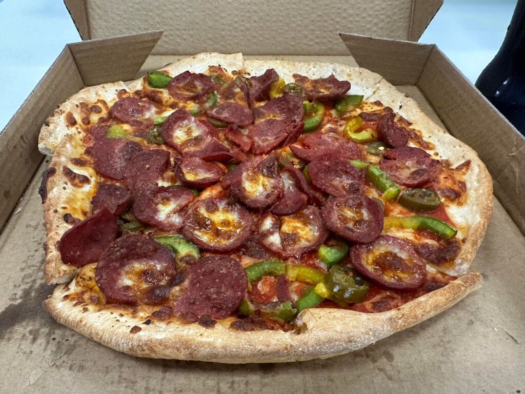 Mexicana pizza placed in an opened pizza box