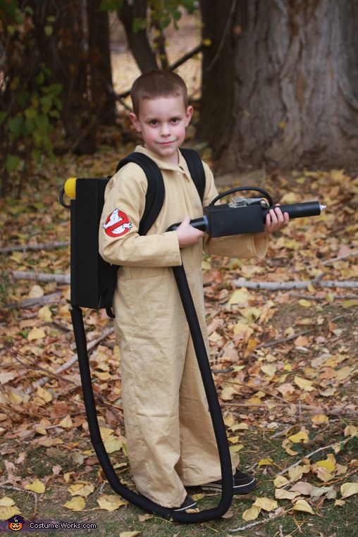 little boy in ghostbusters costume