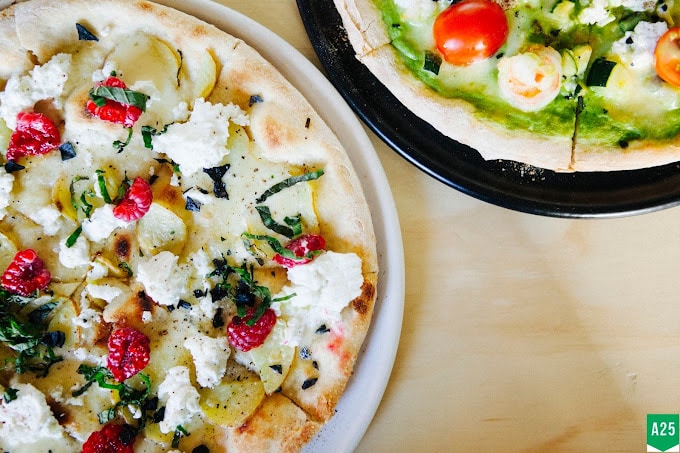 Pizza with Buffalo Mozzarella, and Parsley & Pizza with Cherry Tomato, Basil, and Walnut Pesto by the Owner